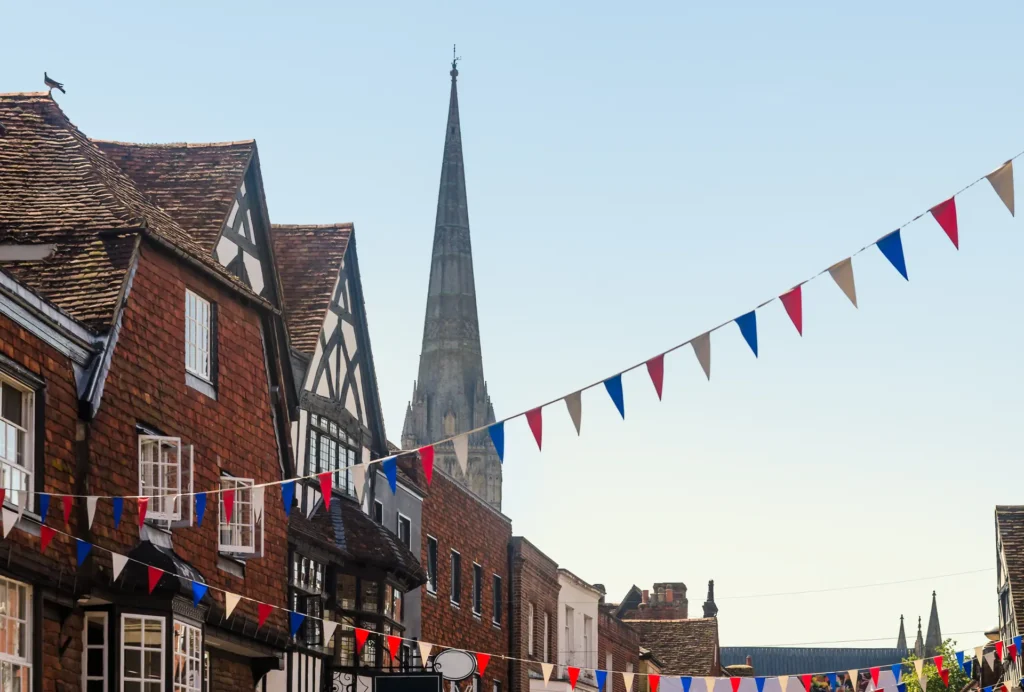 English market town high street with bunting and independent shops